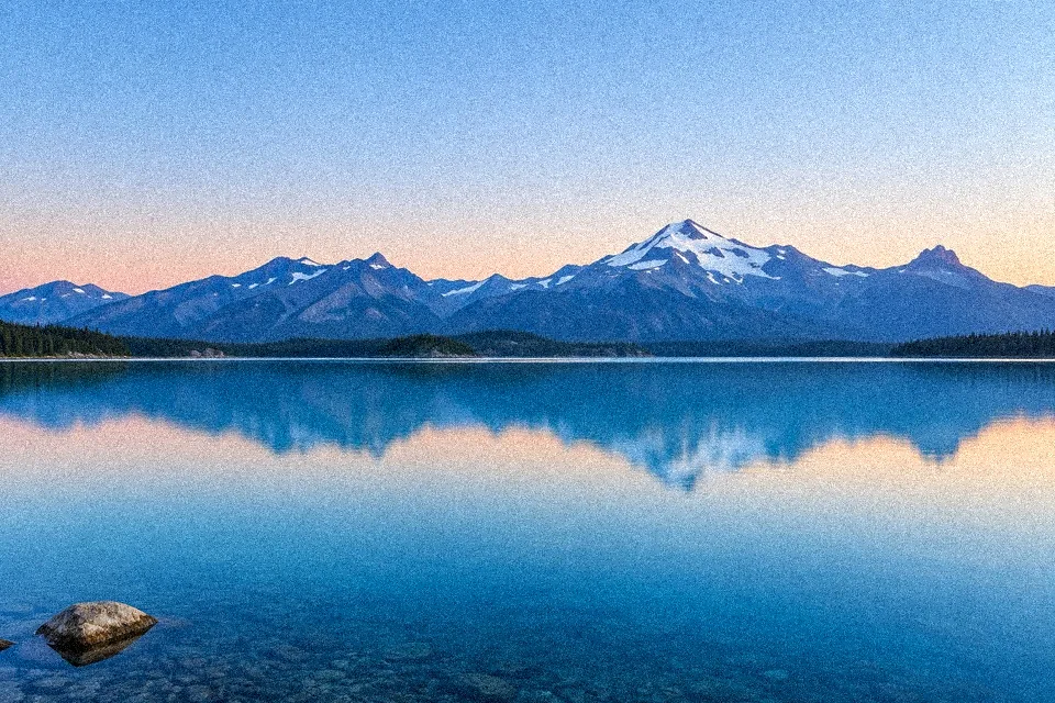 Mountain lake at dawn with the Light Grain noise preset applied